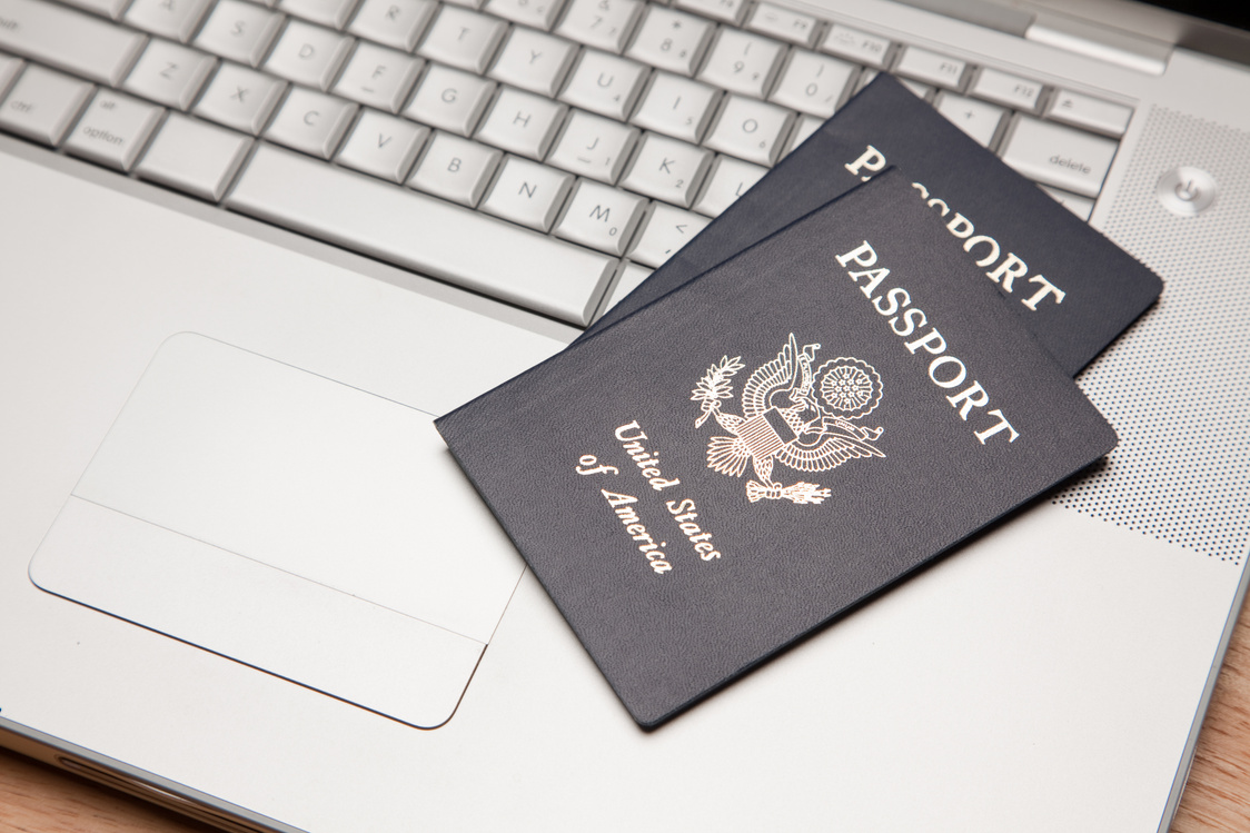 Passports on Laptop Keyboard